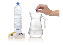 Water flavour standard being added to water prior to evaluation by a professional taste panel